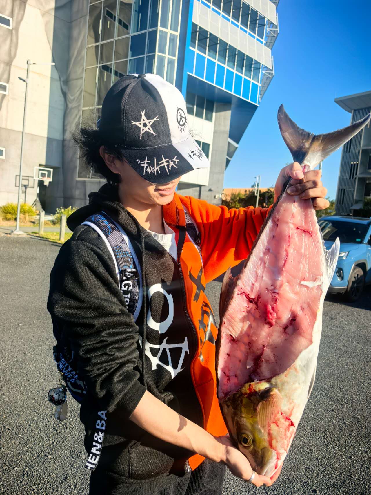 Holding a massive fish I caught near Coolangatta